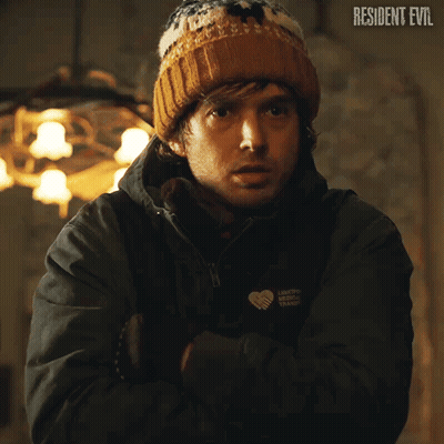 Man In Hat And Jacket With Resident Evil GIF