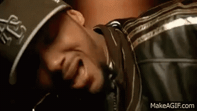 Man In Hat And Leather Jacket Lying Down Mouth Open GIF