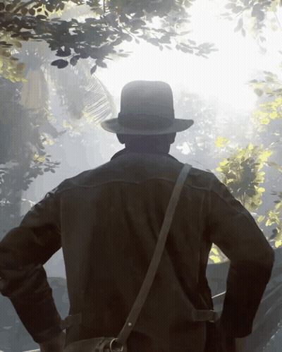 Man In Hat And Leather Jacket Standing In Forest GIF