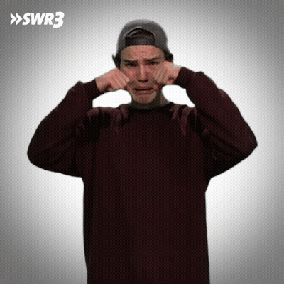 Man In Hat And Maroon Sweater Covering Ears With SWR3 Logo GIF