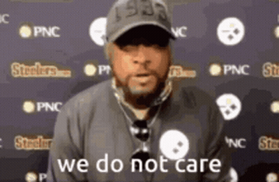 Man In Hat And Necklace Says We Do Not Care GIF