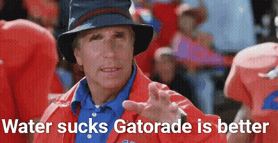 Man In Hat And Orange Jacket Saying Water Sucks Gatorade Is Better GIF