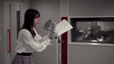 Man In Hat And Plaid Shirt At Microphone GIF