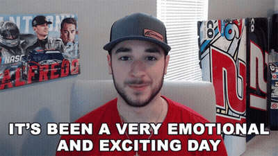 Man in Hat and Red Shirt Saying It's Been a Very Emotional and Exciting Day