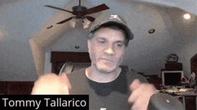 Man In Hat And Red Shirt With Name Tommy Tallarico GIF