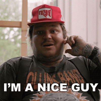 Man In Hat And Rolling Stones Shirt Says I'm A Nice Guy GIF
