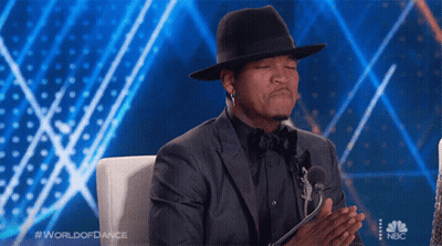Man In Hat And Suit At Microphone World Of Dance GIF