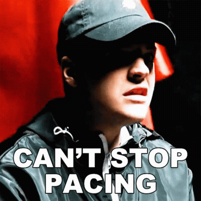 Man In Hat And Sunglasses Can't Stop Pacing GIF