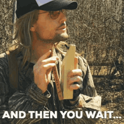 Man In Hat And Sunglasses Holding Wooden Object Saying And Then You Wait GIF