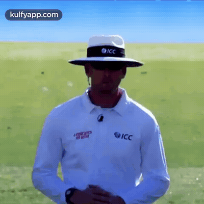 Man In Hat And Sunglasses In Field GIF
