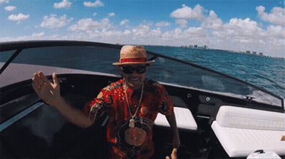 Man In Hat And Sunglasses On Boat With Gucci Shirt GIF