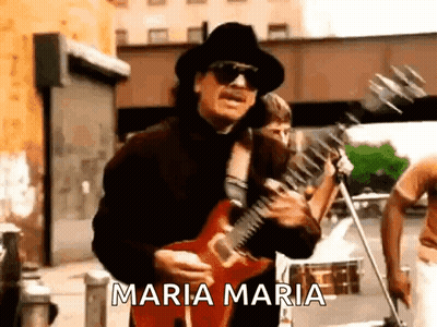 Man In Hat And Sunglasses Playing Guitar On Street GIF