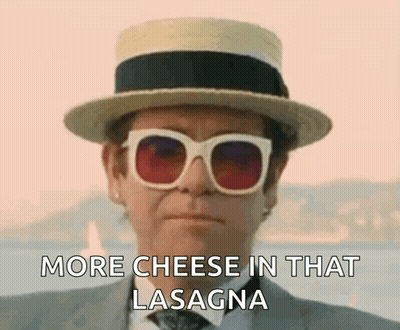 Man In Hat And Sunglasses Saying More Cheese In That Lasagna GIF