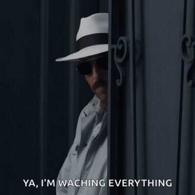 Man In Hat And Sunglasses Says Watching Everything GIF