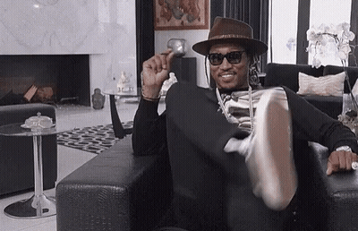 Man In Hat And Sunglasses Sitting GIF