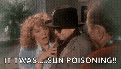 Man In Hat And Sunglasses Talking To Woman And Man In Trench Coat GIF