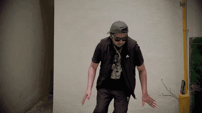 Man In Hat And Sunglasses With Number 9 On Shirt GIF