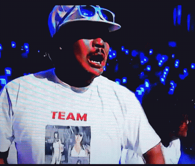 Man In Hat And Sunglasses With Team Shirt GIF