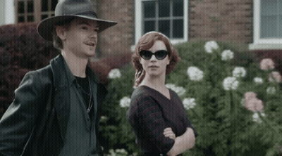 Man In Hat And Sunglasses With Woman Sunglasses GIF