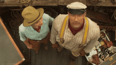 Man In Hat And Suspenders And Woman In Blue Shirt GIF