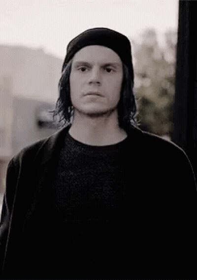 Man In Hat And Sweater Black And White Photo GIF
