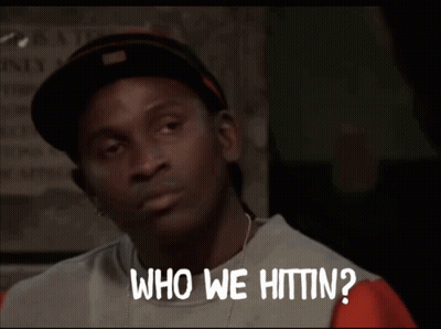 Man In Hat And Sweater Saying Who We Hittin GIF