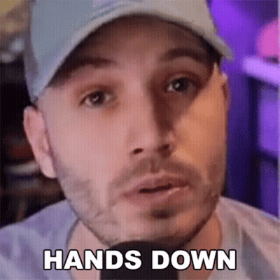 Man In Hat And T-Shirt Saying Hands Down Into Microphone GIF