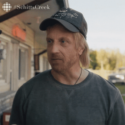 Man In Hat And T-Shirt With Schitts Creek GIF