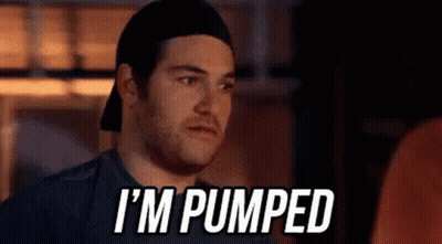 Man In Hat And Tank Top Next To Man In Suit And Tie GIF