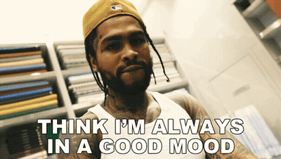 Man In Hat And Tank Top Says Think I'm Always In A Good Mood GIF