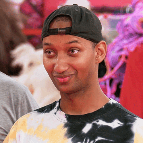 Man In Hat And Tie Dye Shirt GIF