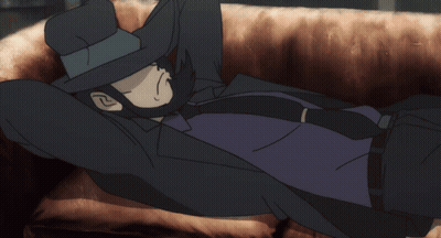 Man In Hat And Tie Lying On Couch GIF