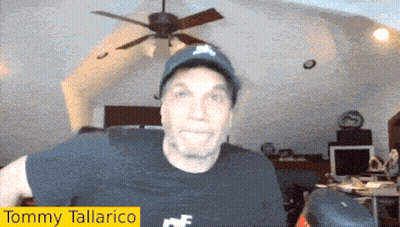 Man In Hat And Tommy Tallarico Shirt GIF