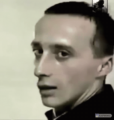 Man In Hat And Turtleneck On Momento App GIF