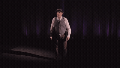 Man In Hat And Vest Purple Curtain Alone GIF