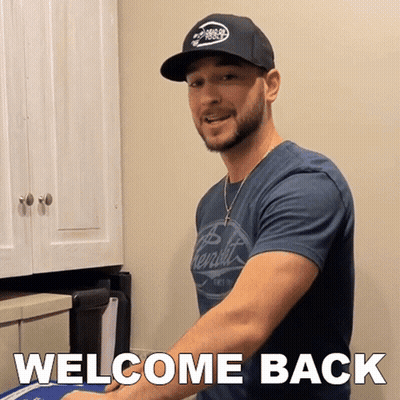Man In Hat And Welcome Back Shirt GIF