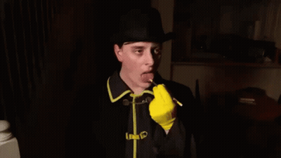 Man In Hat And Yellow Gloves Writing GIF