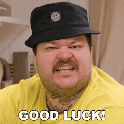 Man In Hat And Yellow Shirt Saying Good Luck GIF