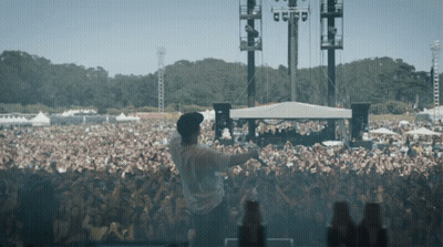 Man In Hat At Festival Crowd GIF