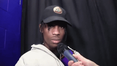 Man In Hat Being Interviewed GIF