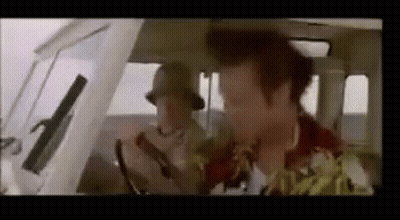 Man In Hat Driving Car With Another Man GIF