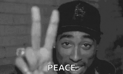 Man In Hat Giving Peace Sign GIF