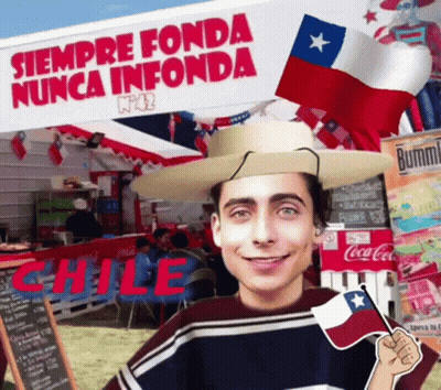 Man In Hat Holding Flag In Front Of Chile Sign GIF