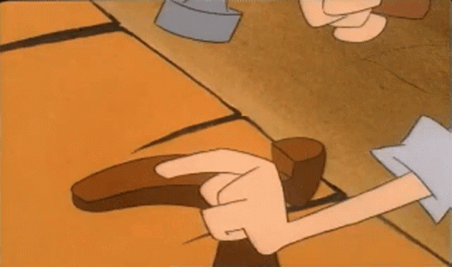 Man In Hat Holding Hammer In Workshop GIF