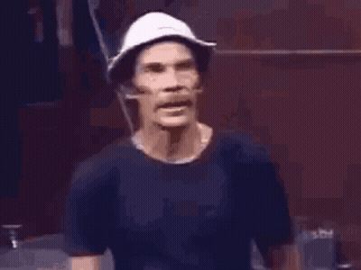 Man In Hat Holding Hand To Chest Smiling GIF