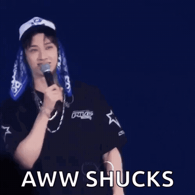 Man In Hat Holding Microphone Making Funny Face GIF