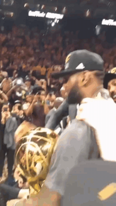 Man In Hat Holding Trophy GIF