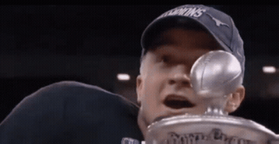 Man In Hat Holding Trophy GIF
