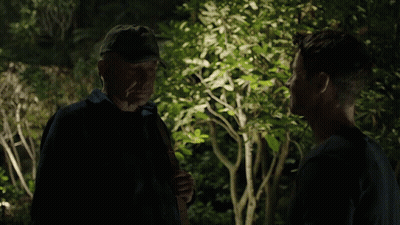Man In Hat Hugging Man In Blue Shirt GIF