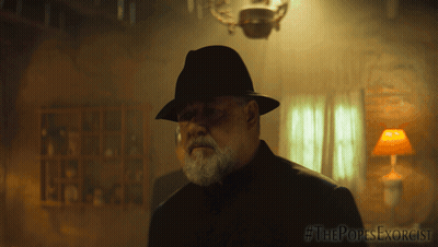 Man In Hat In Dark Room #ThePopesExorcist GIF